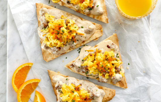 An overhead view of a Breakfast Flatbread, highlighting the versatility of BONICI® parbaked flatbreads.